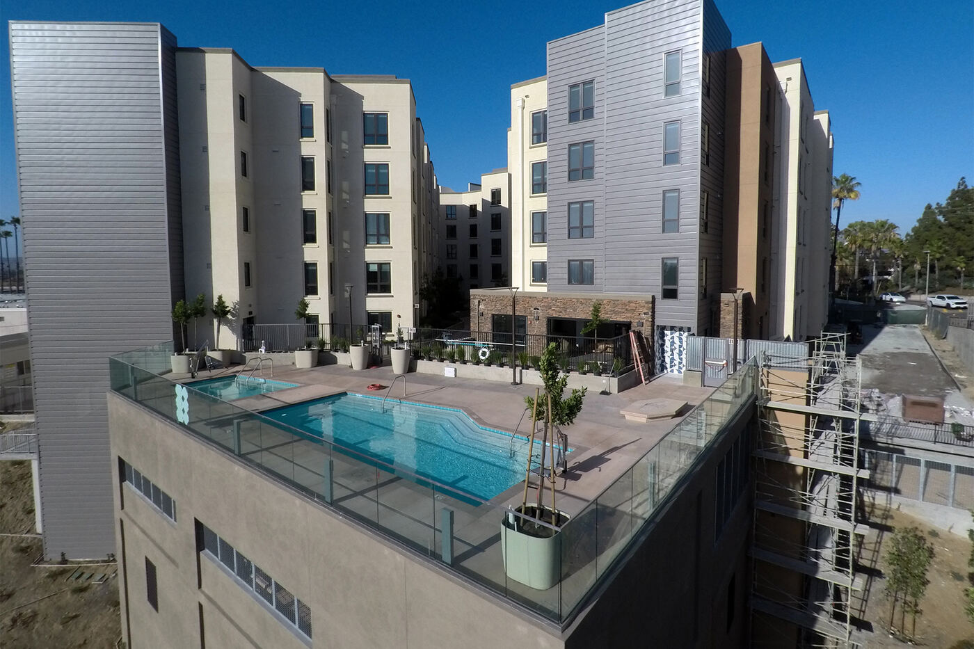 Rooftop pool deck glazing at College View Apartments, San Diego, CA